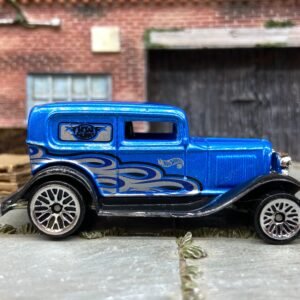 Loose Hot Wheels 1932 Ford Model A Sedan Dressed in Blue and Black