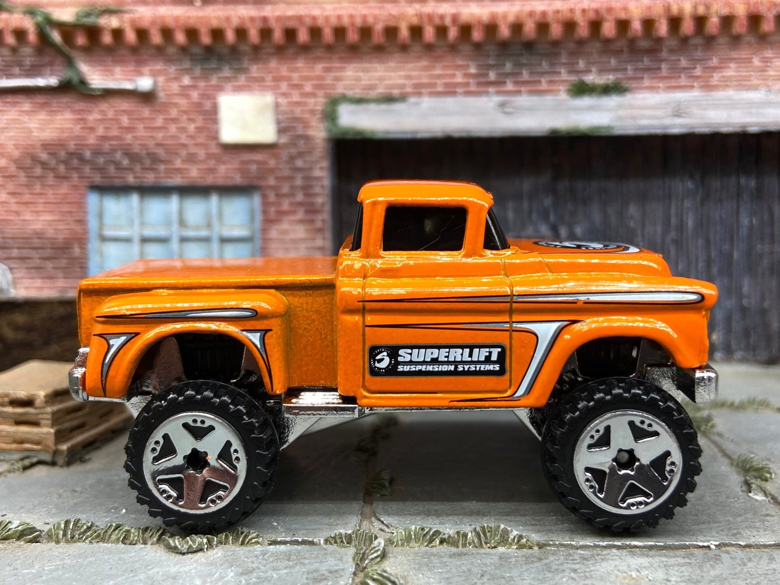 Loose Hot Wheels 1956 Chevy 4X4 Pick Up Truck Dressed in Orange Superlift