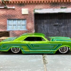 Loose Hot Wheels 1964 Buick Rivera Dressed in Green and Teal
