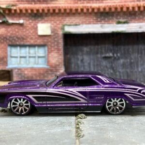 Loose Hot Wheels 1964 Buick Rivera Dressed in Purple, Pink and Black