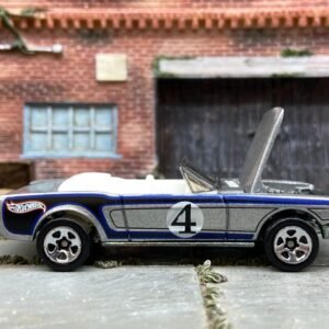 Loose Hot Wheels 1965 Ford Mustang Convertible Dressed in Silver, Blue and Black