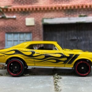 Loose Hot Wheels 1968 Chevy Nova Dressed in Yellow and Black with Flames