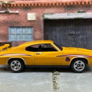 Loose Hot Wheels 1970 Pontiac GTO Judge Dressed in Golden Yellow