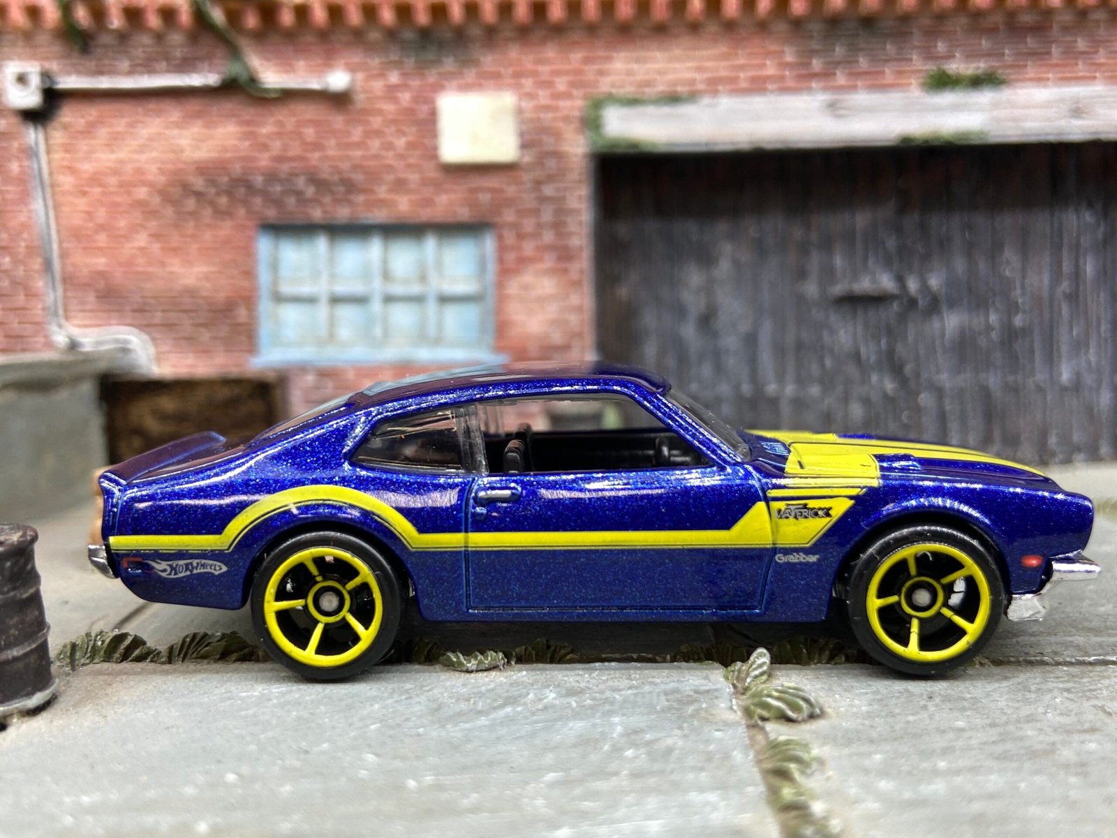 Loose Hot Wheels 1971 Ford Maverick Grabber Dressed in Blue and Yellow