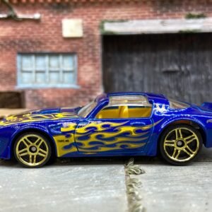 Loose Hot Wheels 1977 Pontiac Firebird T/A in Blue and Yellow with Flames