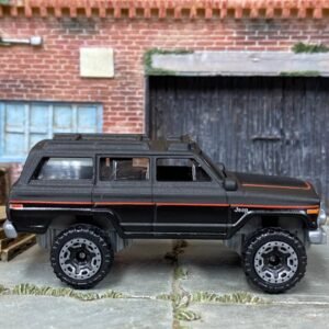Hot Wheels 1988 Jeep Wagoneer - Satin Black and Red