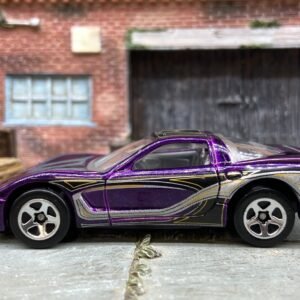 Loose Hot Wheels 1997 Chevy Corvette Dressed in Purple, Black and Silver