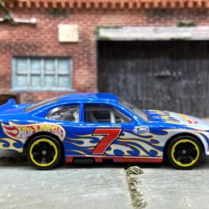 Loose Hot Wheels 2010 Chevy Impala Stock Car Dressed in Hot Wheels Blue with Flames #7 Livery