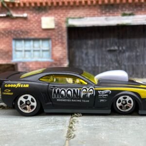 Loose Hot Wheels 2010 Pro-Stock Chevy Camaro Drag Car Dressed in Satin Black and Yellow Mooneyes Livery