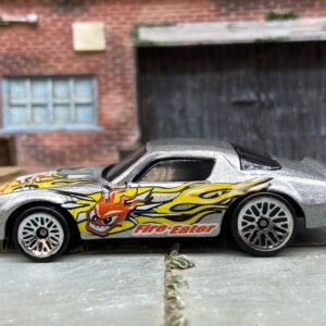 Loose Hot Wheels Camaro Z28 Dressed in Silver Fire Eater Flame Livery