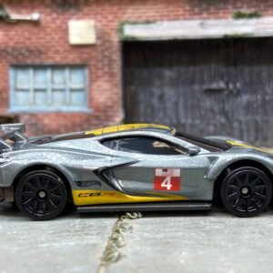 Loose Hot Wheels Chevy Corvette C8-R Race Car Dressed in Silver and Yellow 4