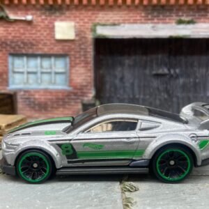 Loose Hot Wheels Custom 2015 Ford Mustang Race Car Dressed in Silver, Green and Black