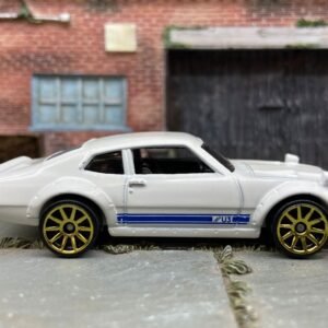 Loose Hot Wheels Custom Ford Maverick Dressed in White and Blue