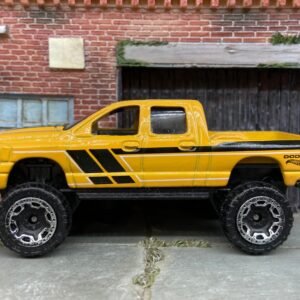Loose Hot Wheels Dodge Ram 1500 4x4 Truck In Yellow and Black