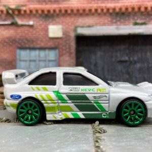 Loose Hot Wheels Ford Escort Rally Dressed in White and Green Race Livery