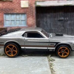Loose Hot Wheels Ford Mustang Mach 1 Dressed in Silver with Black and Orange Stripes