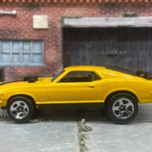 Loose Hot Wheels Ford Mustang Mach 1 Dressed in Yellow and Black