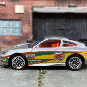 Loose Hot Wheels Porsche 911 GT3 CUP Dressed in Silver, Red, Yellow and Green