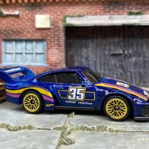Loose Hot Wheels - Porsche 935 - Blue, Yellow and Pink Goodyear 35