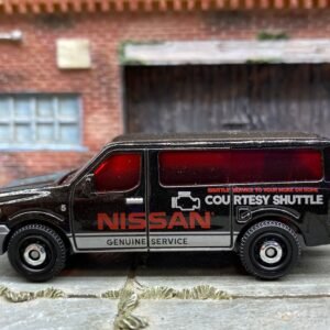 Loose Matchbox - Nissan NV Van - Black and Silver Courtesy Shuttle