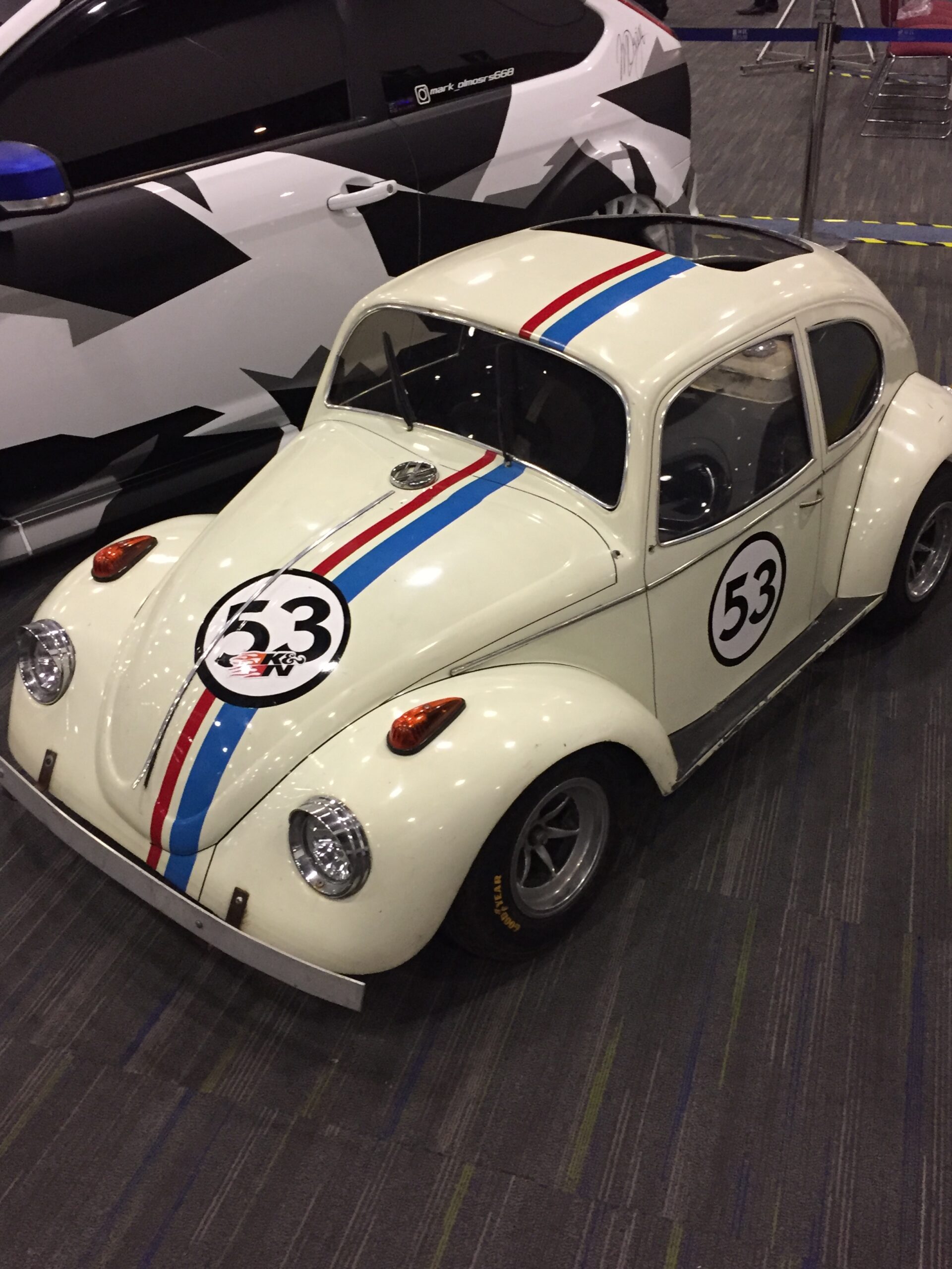 Real photo of a Herbie diecast scale model car at a diecast convention